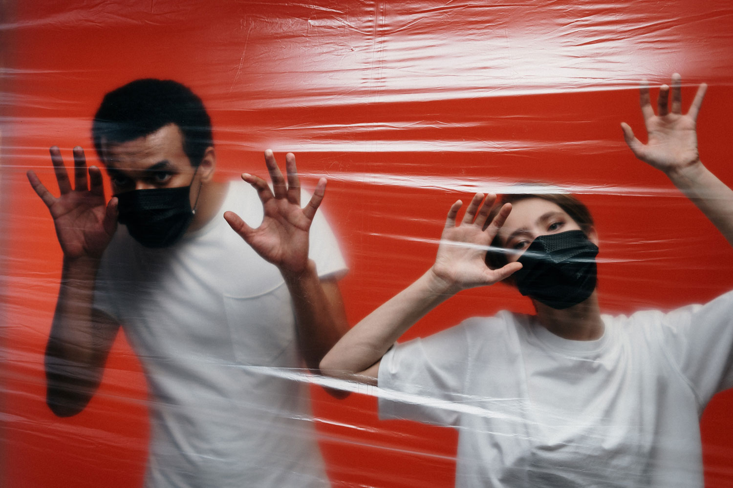 Boy and girl being isolated and wearing face masks